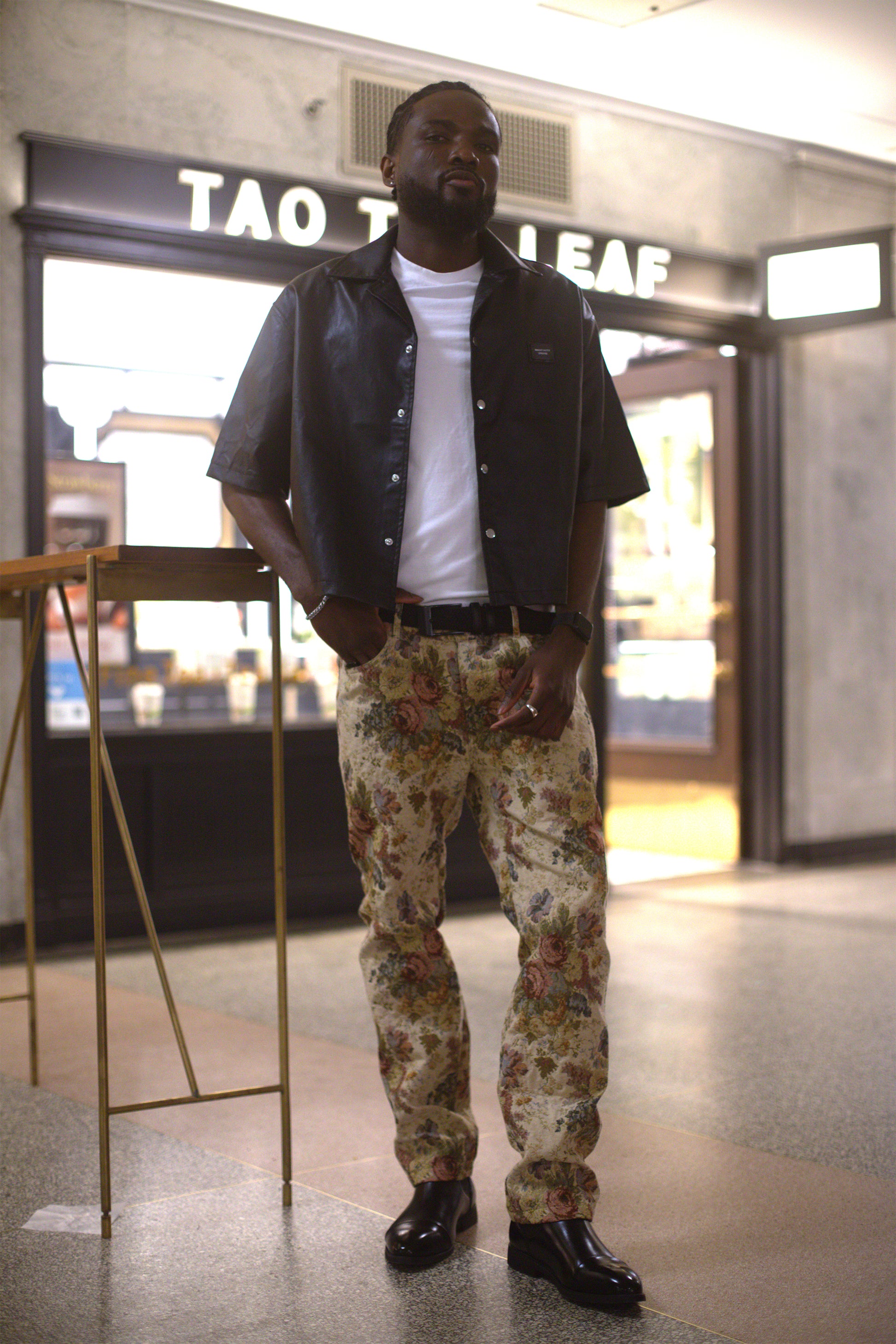 Close-up of woven floral tapestry texture in tan, Renaissance Tapestry Trousers, Counterfeit Money Toronto
